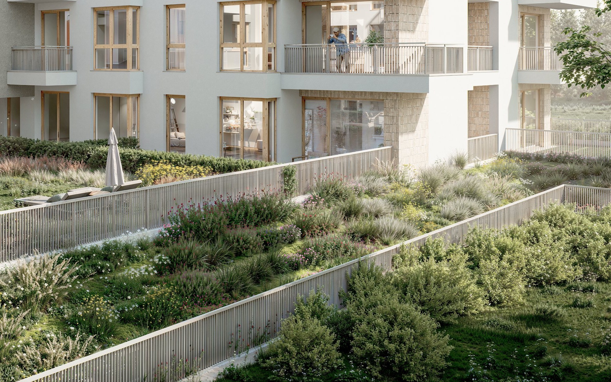 Wizualizacja: ogródki i tarasy na parterze za balustradą, wyżej balkon z loggią